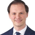 Professional headshot of Harrison Gelber