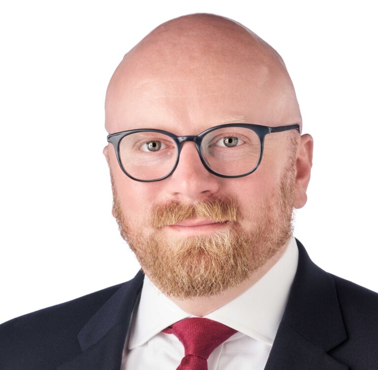 Professional headshot of John Ventura
