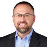 A professional headshot of Brandon McFadden.