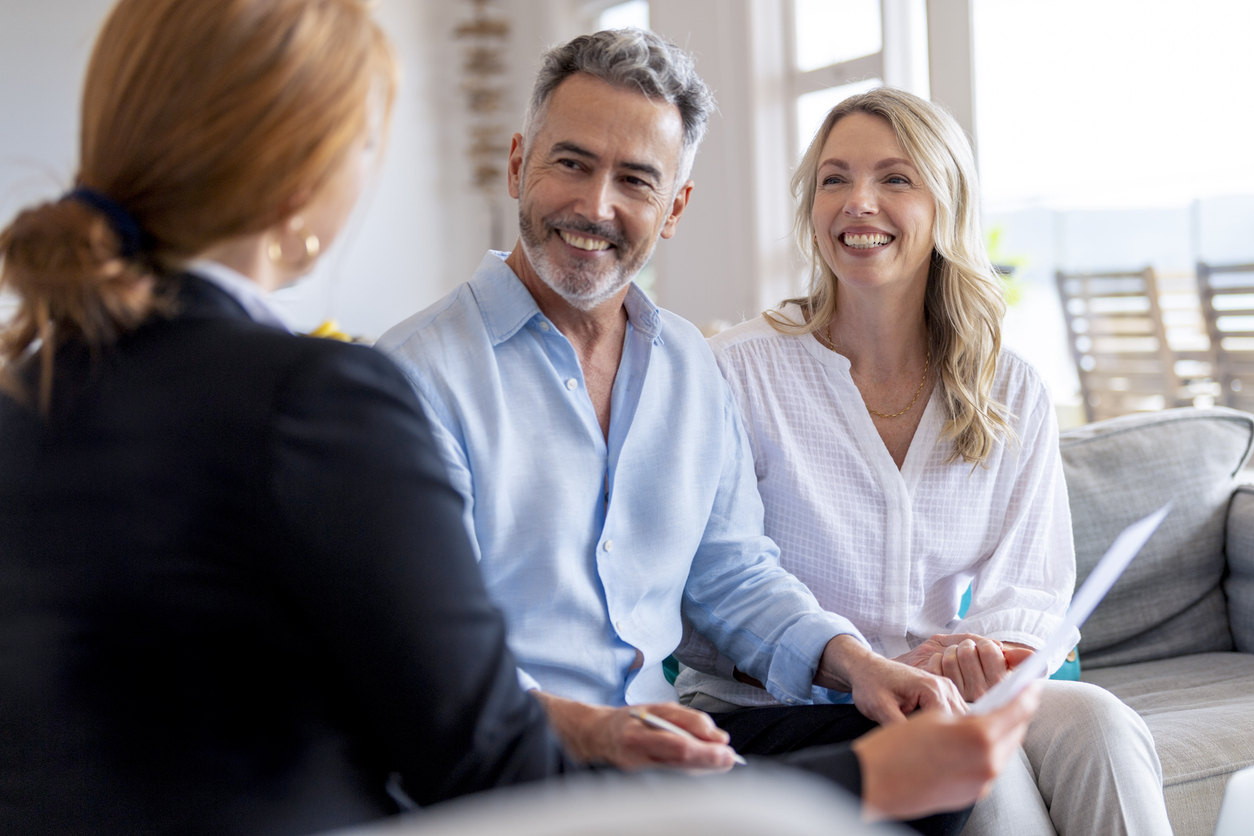 A couple meeting with a wealth advisor