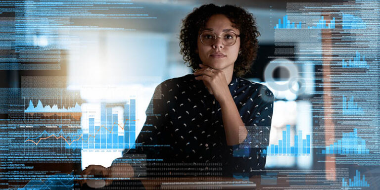 A woman at a computer.